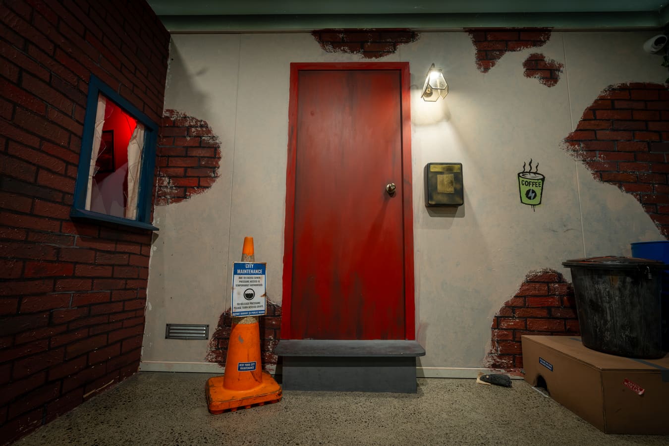 A red door and weathered brickwork inside the urban Crime in the Alley setting.