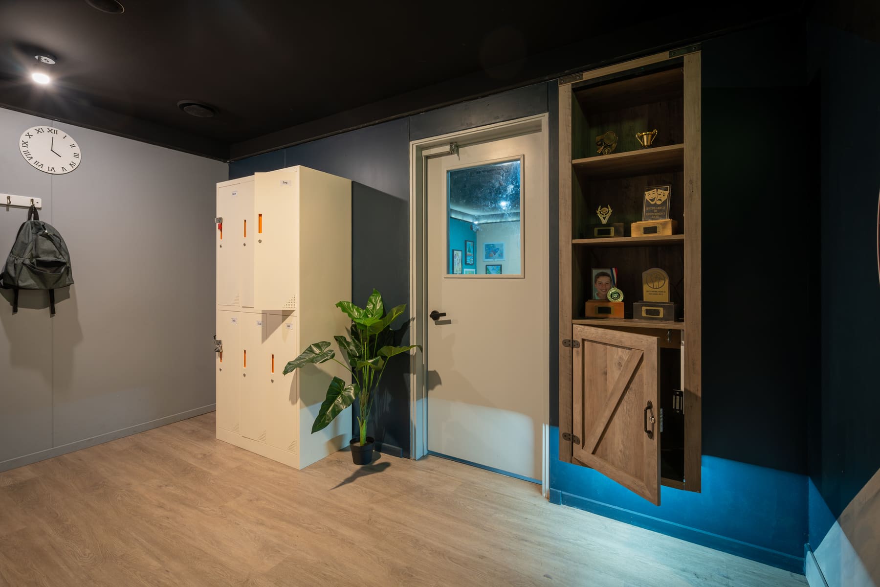 School lockers, a trophy cabinet and classroom details inside Riddle Ridge School.